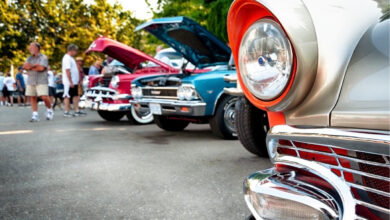 Vintage cars on display at classic automotive exhibition.